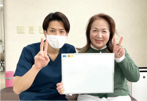 笑顔の患者さんと先生